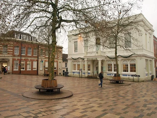 Historic buildings and a paved square in Basingstoke